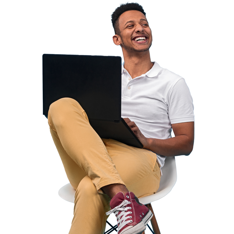 person sitting down in a chair with a laptop