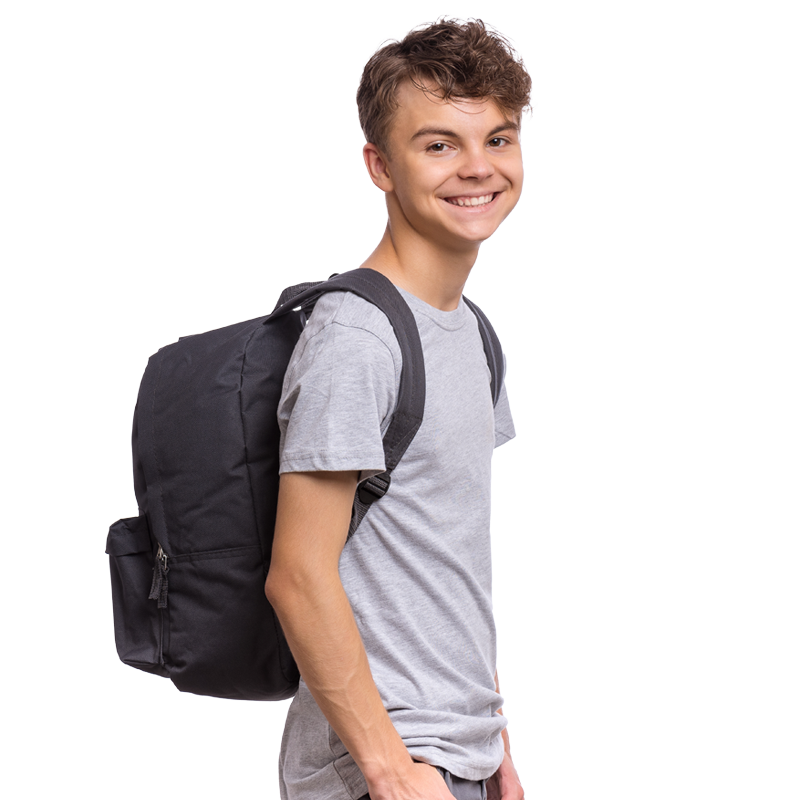 A smiling teenager wearing a backpack